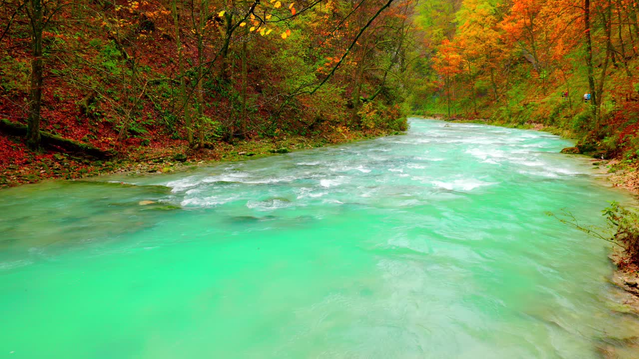 Through Radovna Valley, clear and cold, waters rush, both brave and bold