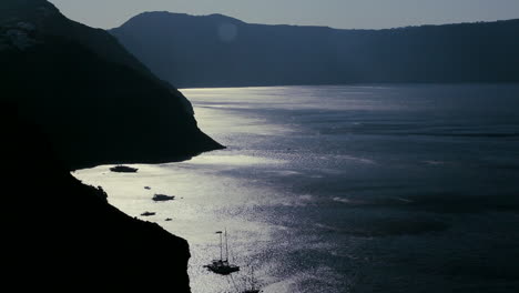 the darkened coast along the ocean