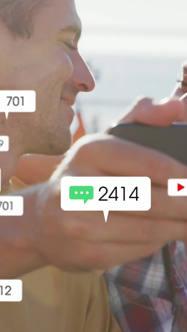 Vertical video: Man holding phone woman coming couple leaning kissing sharing social icons rising