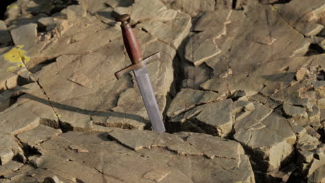 Excalibur-sword-in-rocky-stone-at-sunset