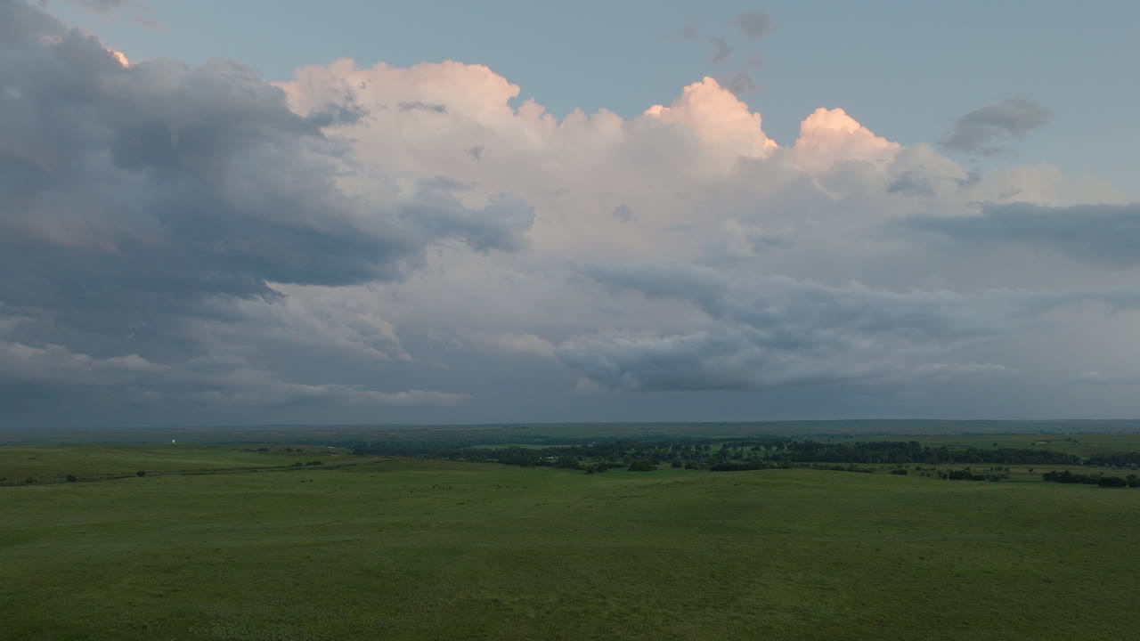 Fluffy Storm Clouds Building At Sunset Aerial View