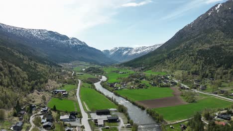 road rv55 leading to sognefjellet mountain - aerial above bovra river seen from fossbergom norway