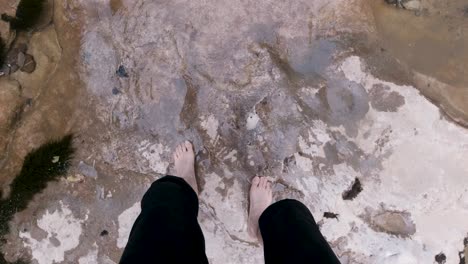 barefoot in a shallow creek