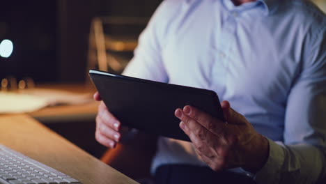 closeup of a business man working late