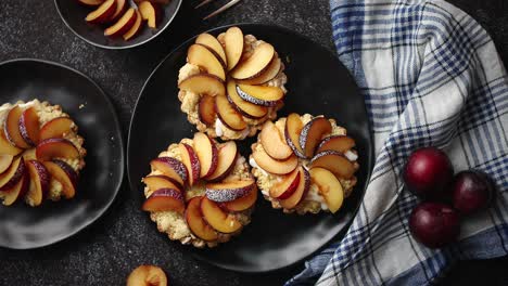 Delicious-homemade-mini-tarts-with-fresh-sliced-plum-fruit