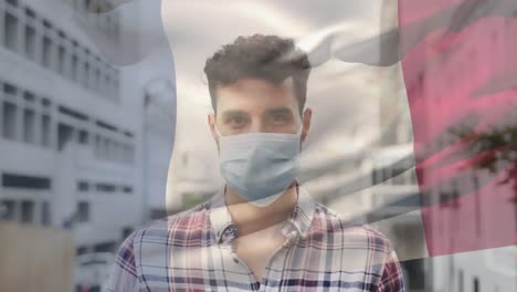 Animación-De-La-Bandera-De-Francia-Ondeando-Sobre-Un-Hombre-Latino-Con-Mascarilla-En-La-Calle-De-La-Ciudad