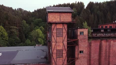 drone footage of a nearby former socialist brick factory in saxony in the middle of nowhere as drone heads out the camera brings the sheer size into full view