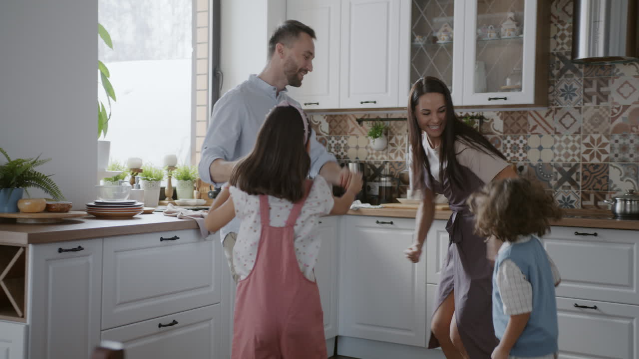 Family Dancing in the Kitchen