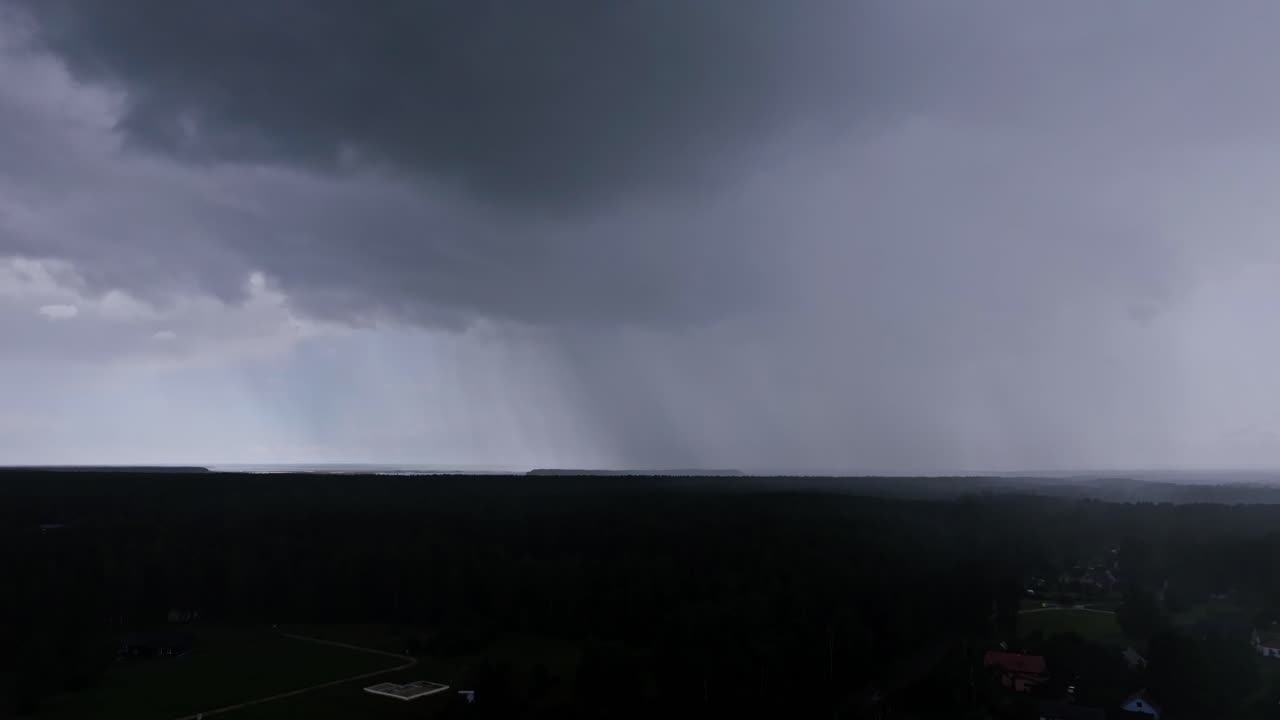 Dramatic storm over countryside works as metaphor for political economic risk