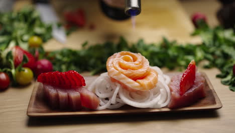 chef prepares gourmet sashimi with a culinary torch