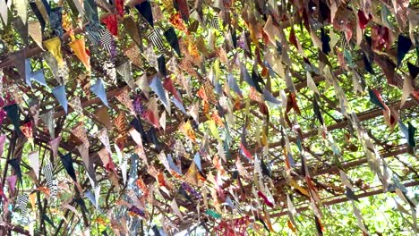 vibrant mobiles hanging and swaying in the breeze