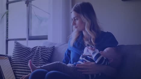 Animation-of-U.S.flag-drawing-over-Caucasian-woman-feeding-her-baby