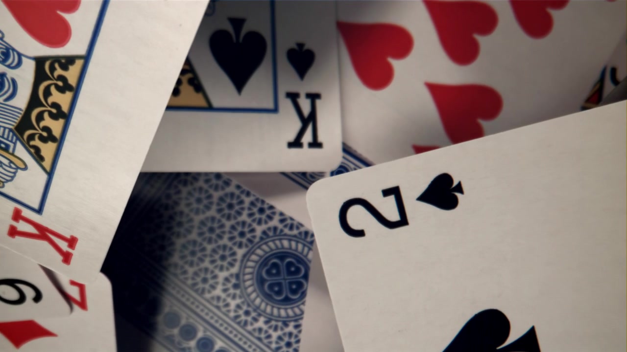 Macro Shot of Scattered Playing Cards with Changing Focus