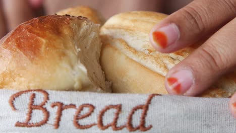 close up of a basket of bread rolls