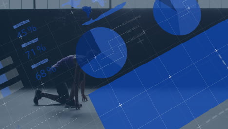woman crouching on studio floor, interacting with technology data visualization pie charts grid map
