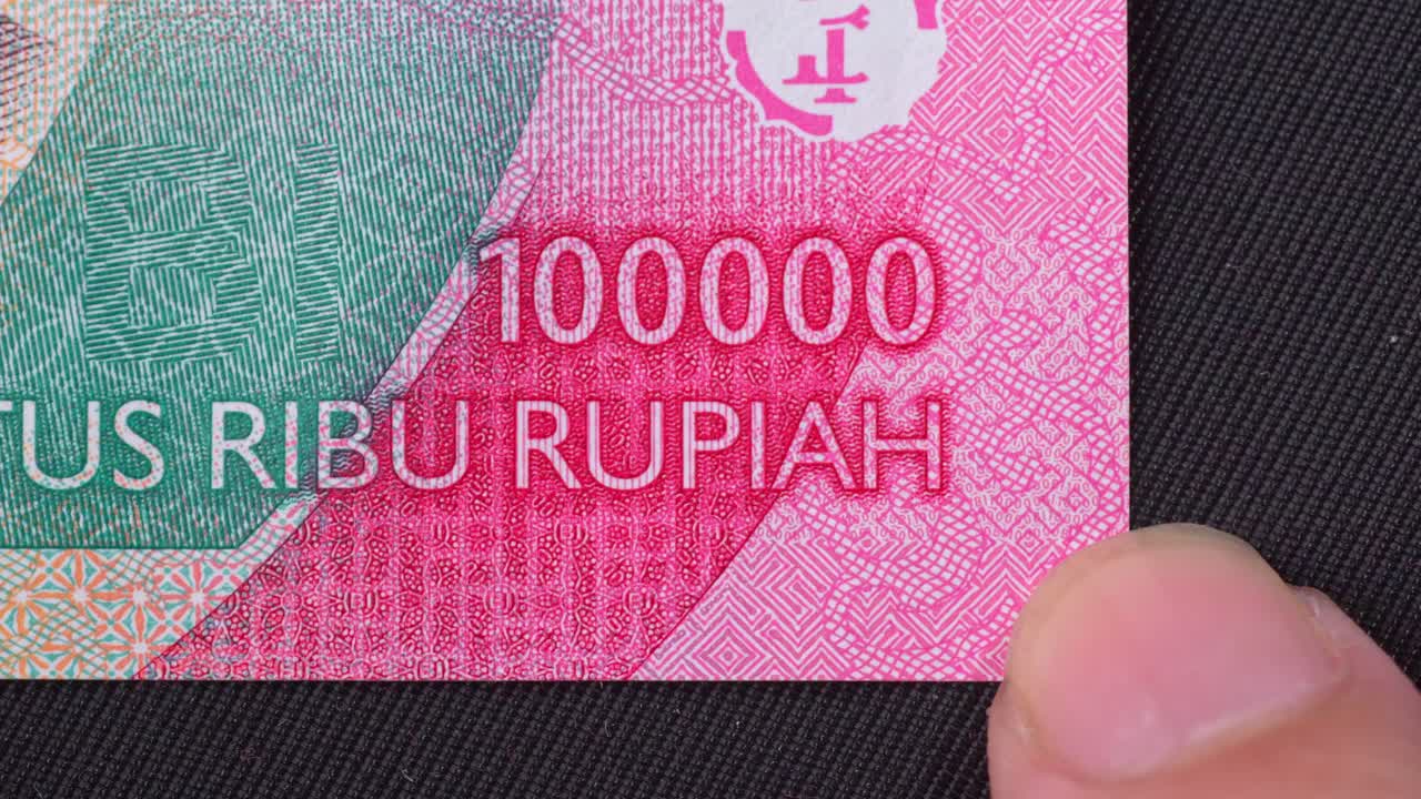Close-up, Indonesian language, printed text, official legal banknotes