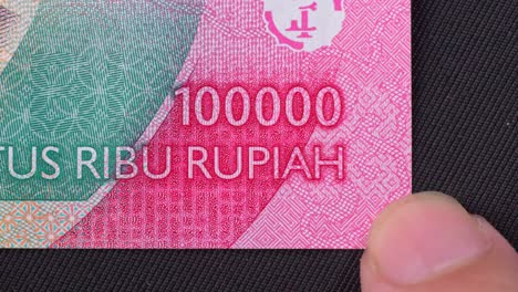 close-up, indonesian language, printed text, official legal banknotes