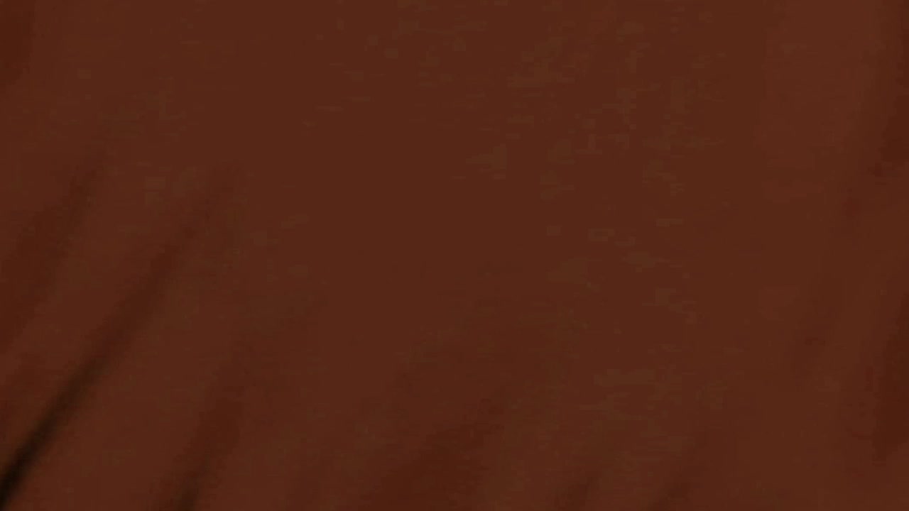 Abstract Brown Fabric Texture Moving in Light and Shadow