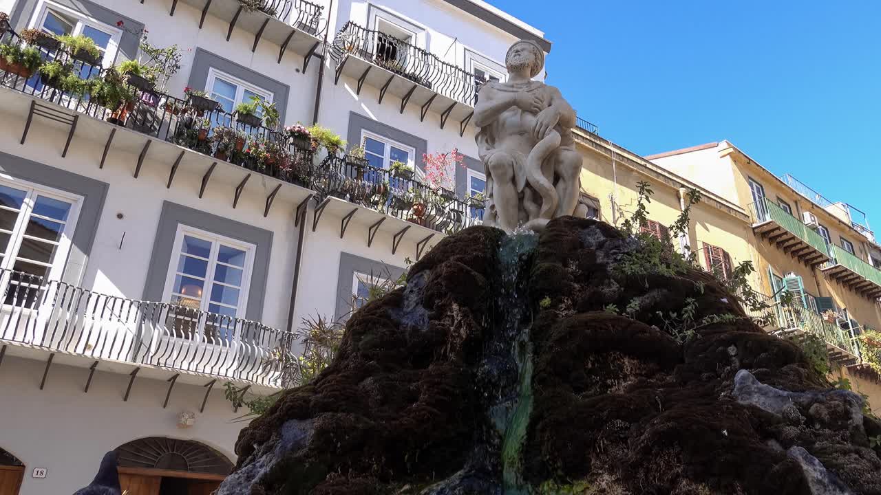 Ancient Stone Statue Fountain in European City