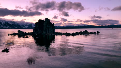 beautiful tufa at mono lake reflecting in the water during a dramatic sunset