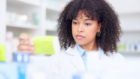 a chemist doing stocktake while working