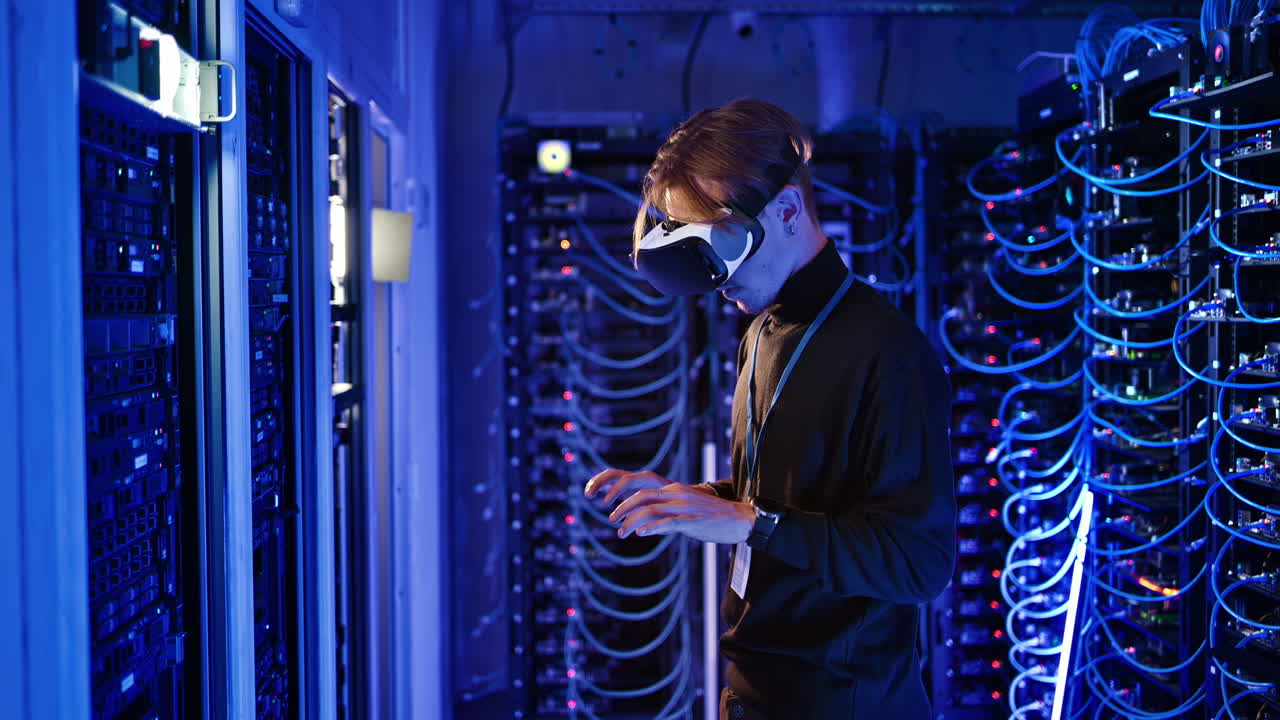 Man using Virtual Reality headset in a server room