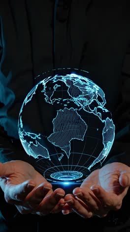 a futuristic video concept with a glowing digital globe held in hands