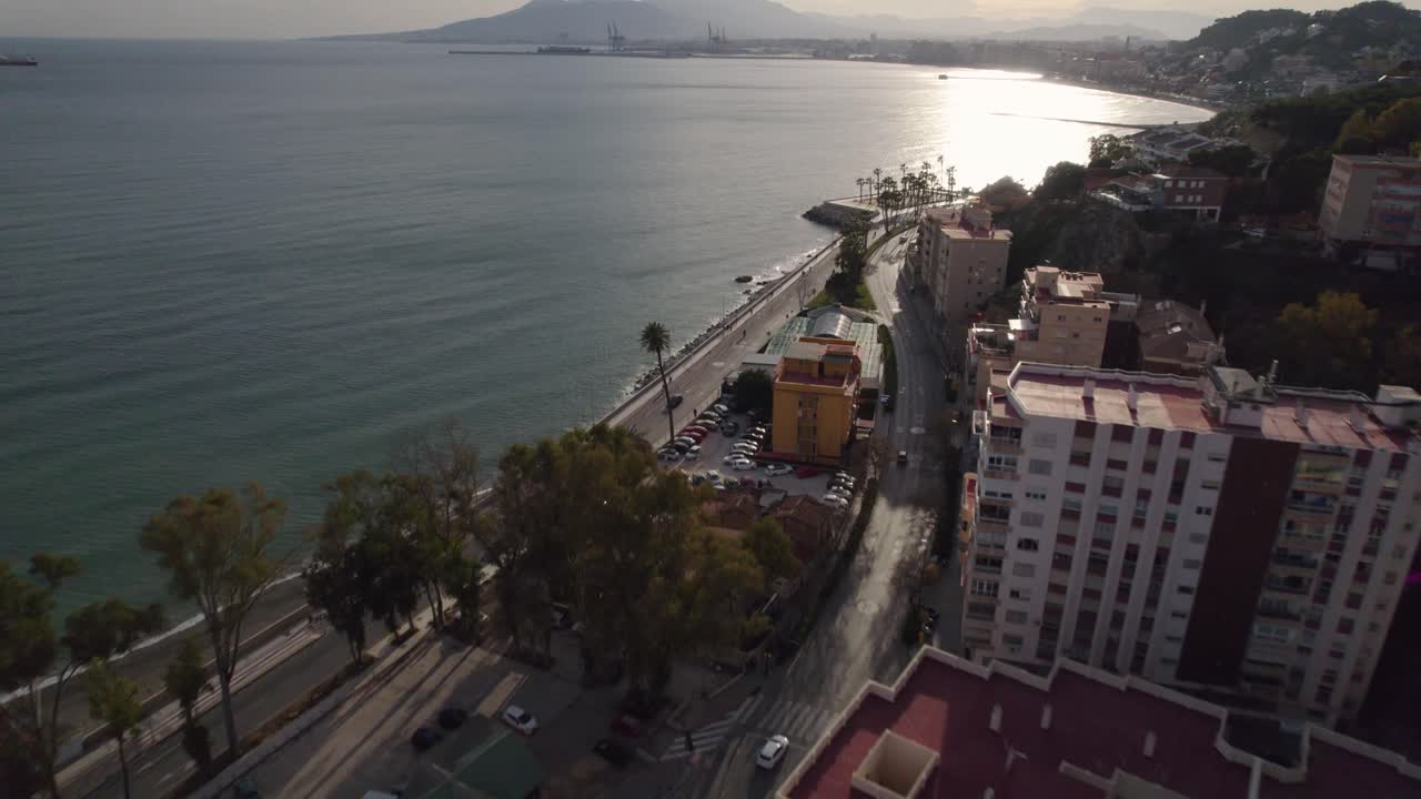 Drone aerial landscape waterfront afternoon sunset buildings apartments street travel tourism coastline seaside M&aacute;laga Pedregalejo Spain Europe