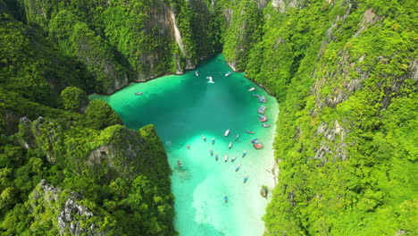 epic phi phi island lagoon in middle of tropical green mountains