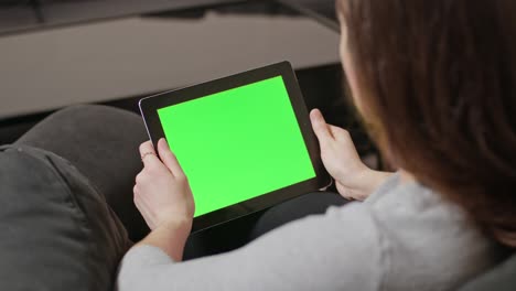 girl using digital tablet pc with blue screen