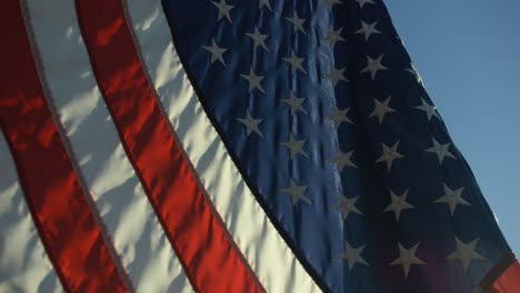 closeup of american flag waving in slow motion