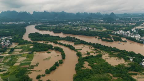 flooded agricultural land in flood water in china, aerial drone view