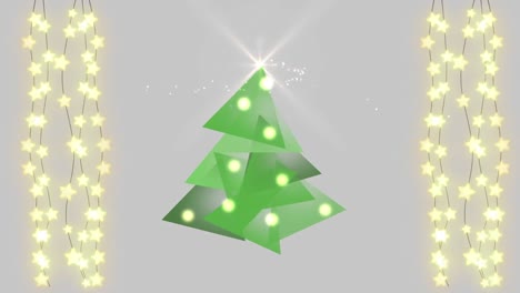 Digital-Christmas-tree-against-strings-of-fairy-lights