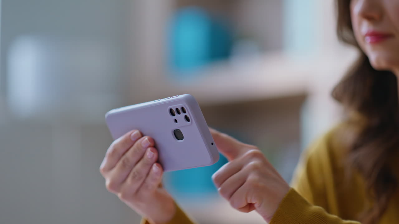 Businesswoman browsing application mobile phone sitting corporate office closeup