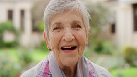 Happy-senior,-laugh-and-smile-of-elderly-woman