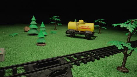 toy train diorama with tanker car