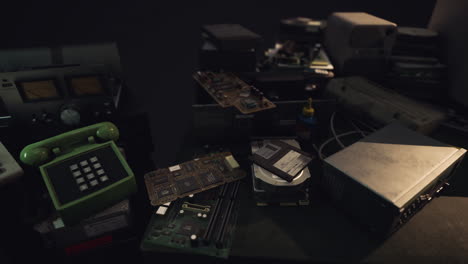 pile of old electronics and computer parts