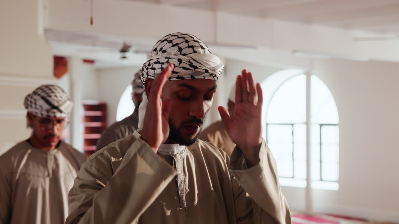 Muslim men praying in a mosque