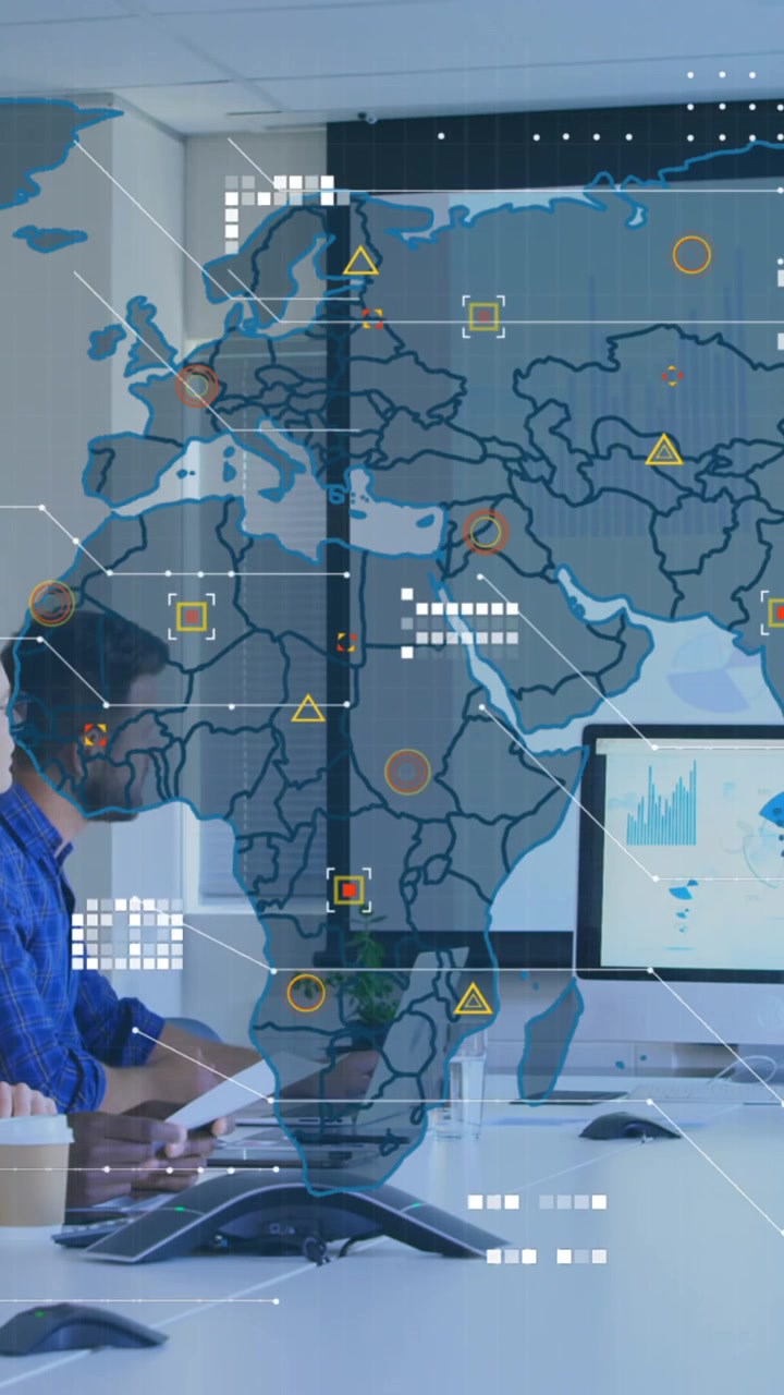 Animation of world map against diverse colleagues discussing together in a meeting room at office