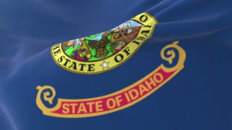 flag of idaho state waving at wind, region of the united states - loop