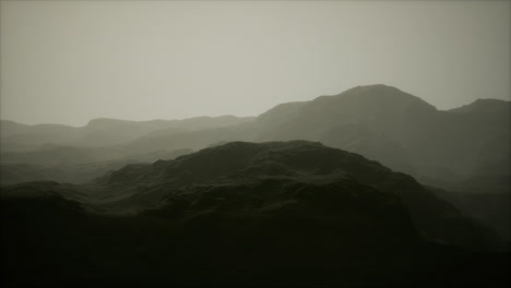 landscape of the dolomites mountain range covered in the fog