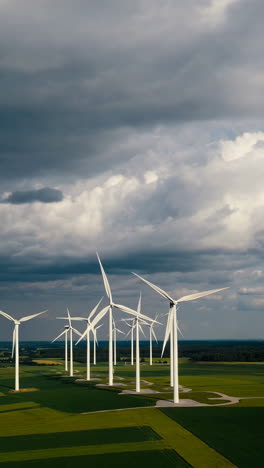 wind farm under a cloudy sky