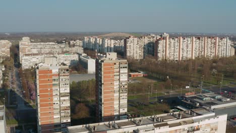 Gentle-flyover-of-a-group-of-apartment-buildings-in-Zagreb,-Croatia-in-the-afternoon