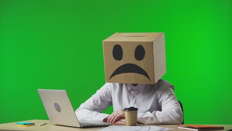 person with cardboard box head