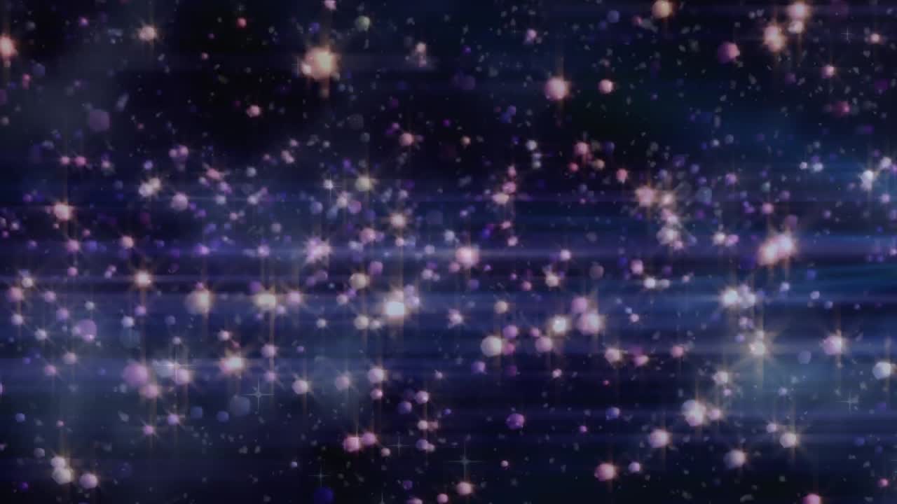 검은 바탕 위에 빛나는 다채로운 반점의 애니메이션