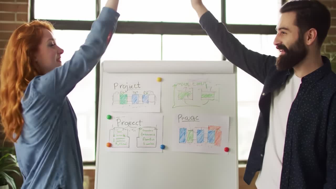 Engaged colleagues enthusiastically check off project updates while celebrating their teamwork and collaboration in a bright workspace during an afternoon brainstorming session.