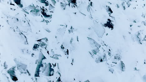 A-frozen-Lake-Michigan-unfolds-beneath-the-lens-of-a-soaring-drone