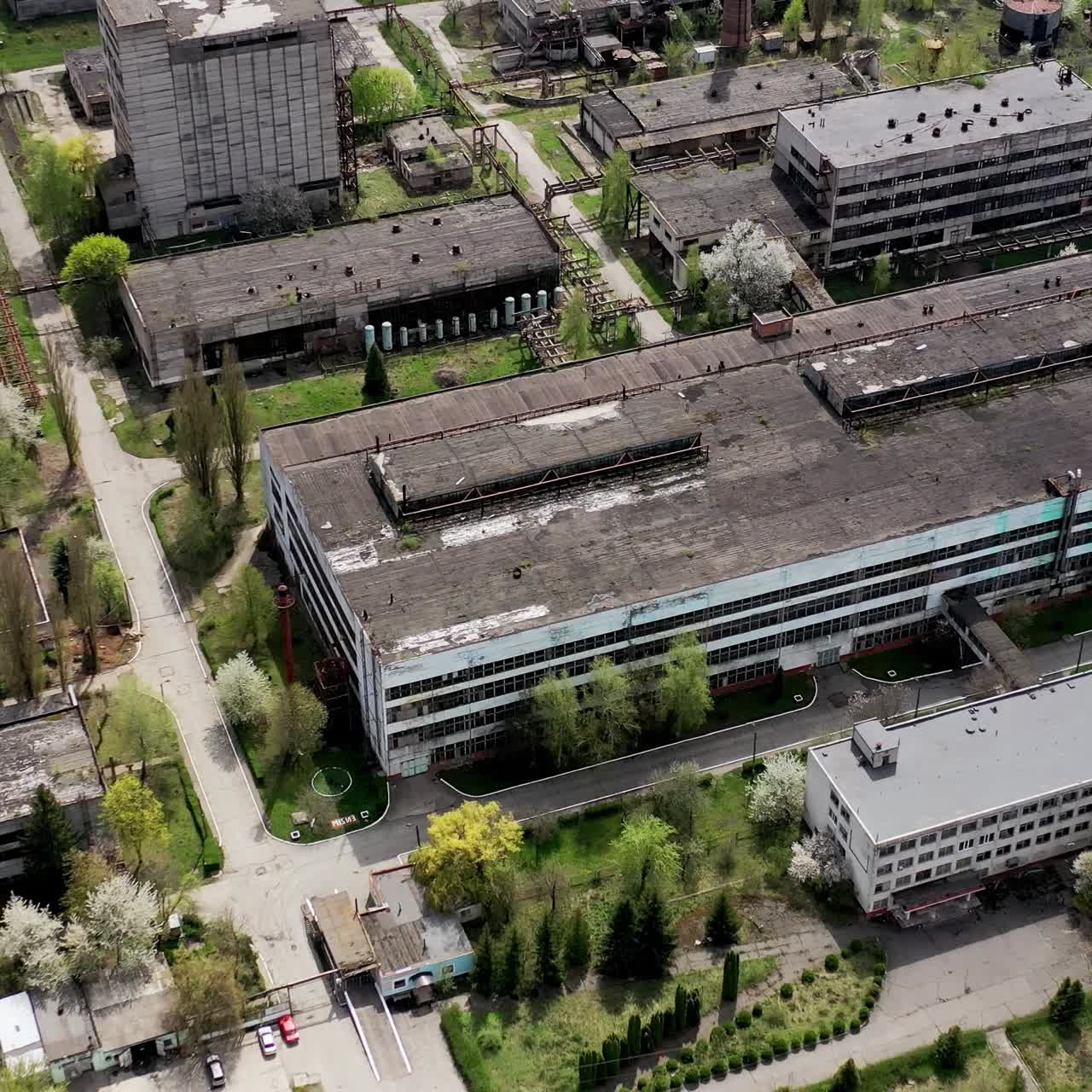 Aerial shot of big abandoned factory. aerial view of ruined old factory