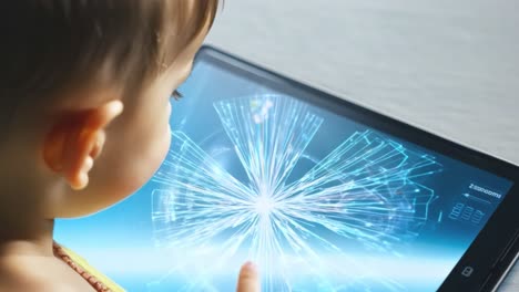 child interacting with a tablet