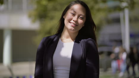 beautiful happy asian girl posing outdoor